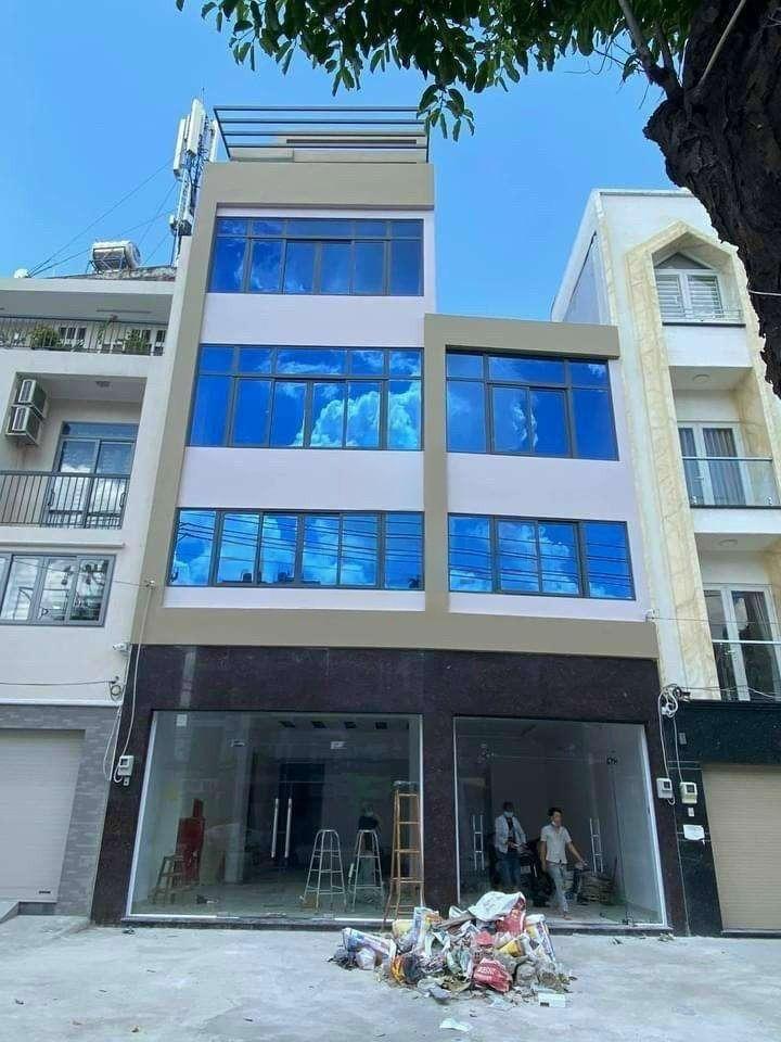 Cho Thuê Nhà Mặt Tiền 909 - 911 Cách Mạng Tháng 8, Quận Tân Bình – Thang Máy, Nhà Mới